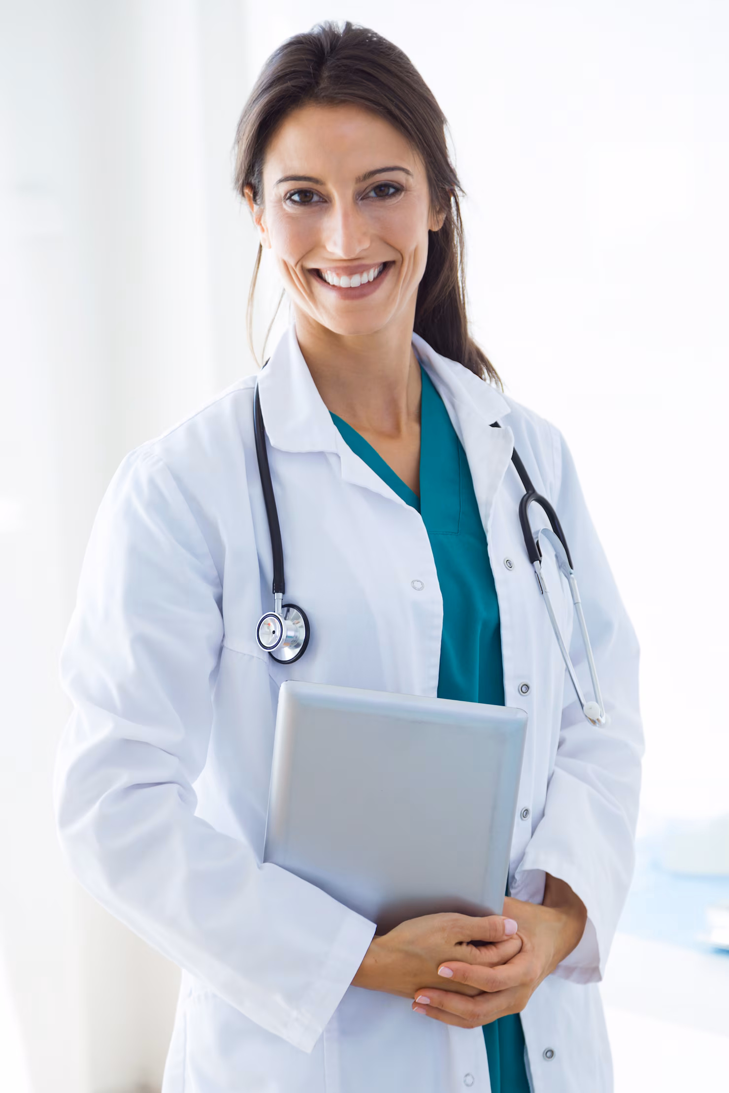 beautiful young female doctor looking camera